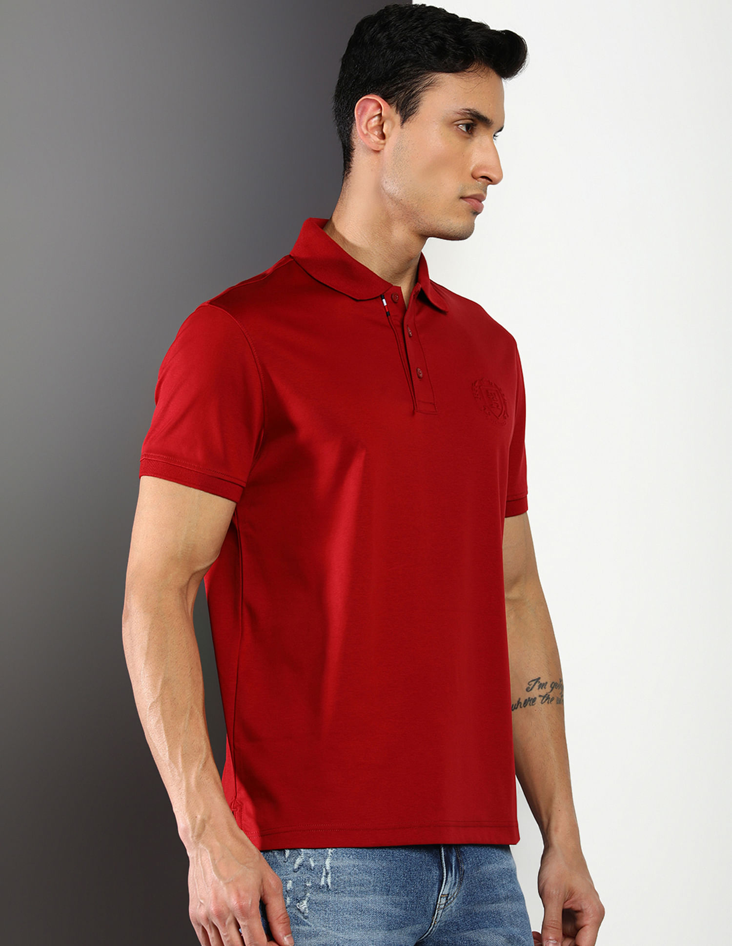 Buy Tommy Hilfiger Embossed Logo Interlock Regular Fit Polo Shirt
