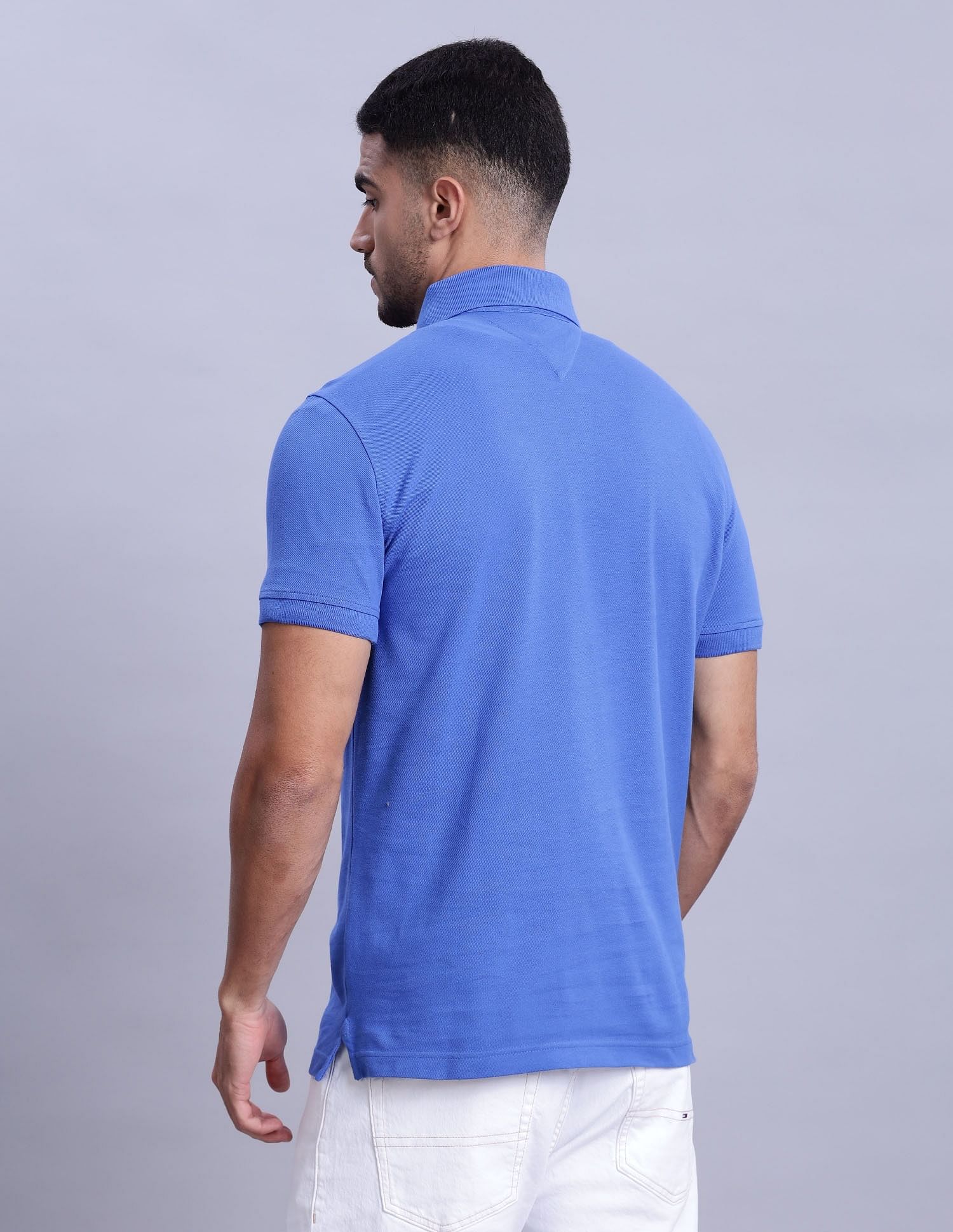 Tommy Hilfiger Mens Blue Solid Polo Shirt