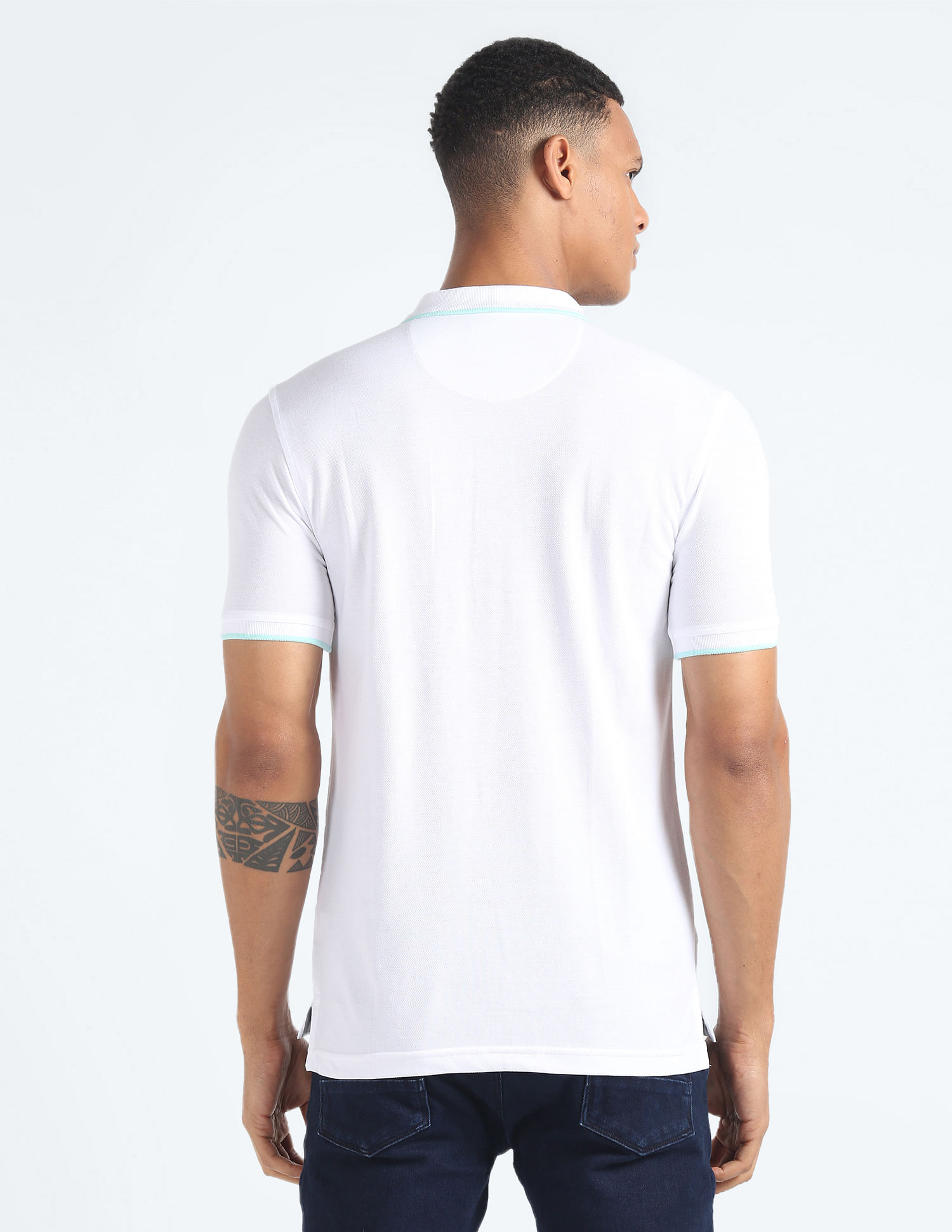 Flying Machine Solid Appliqued Logo Polo Shirt