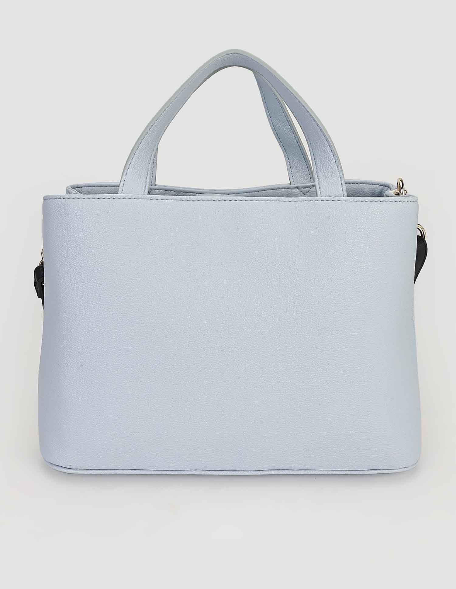 Tommy Hilfiger Solid Blue PU Hand Bags