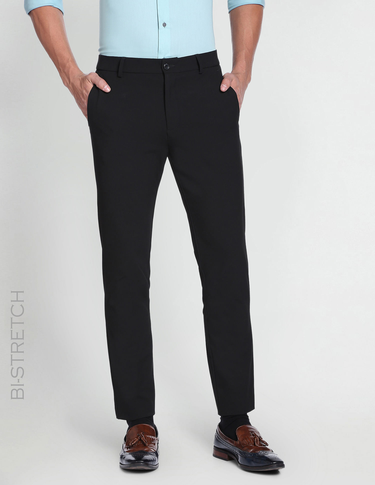 Buy U.S. POLO ASSN. Men Khaki Mid Rise Solid Formal Trousers online