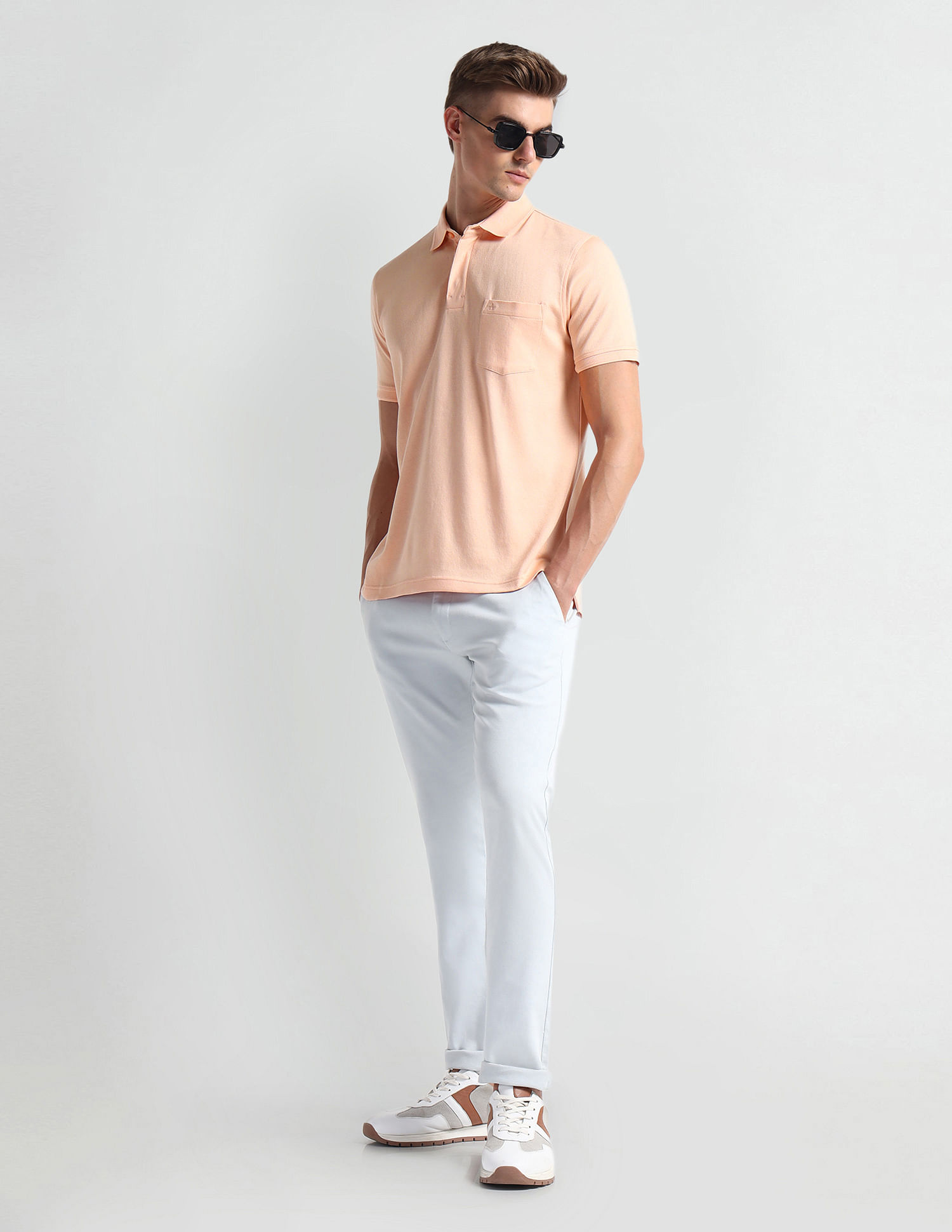Arrow Patch Pocket Solid Polo Shirt