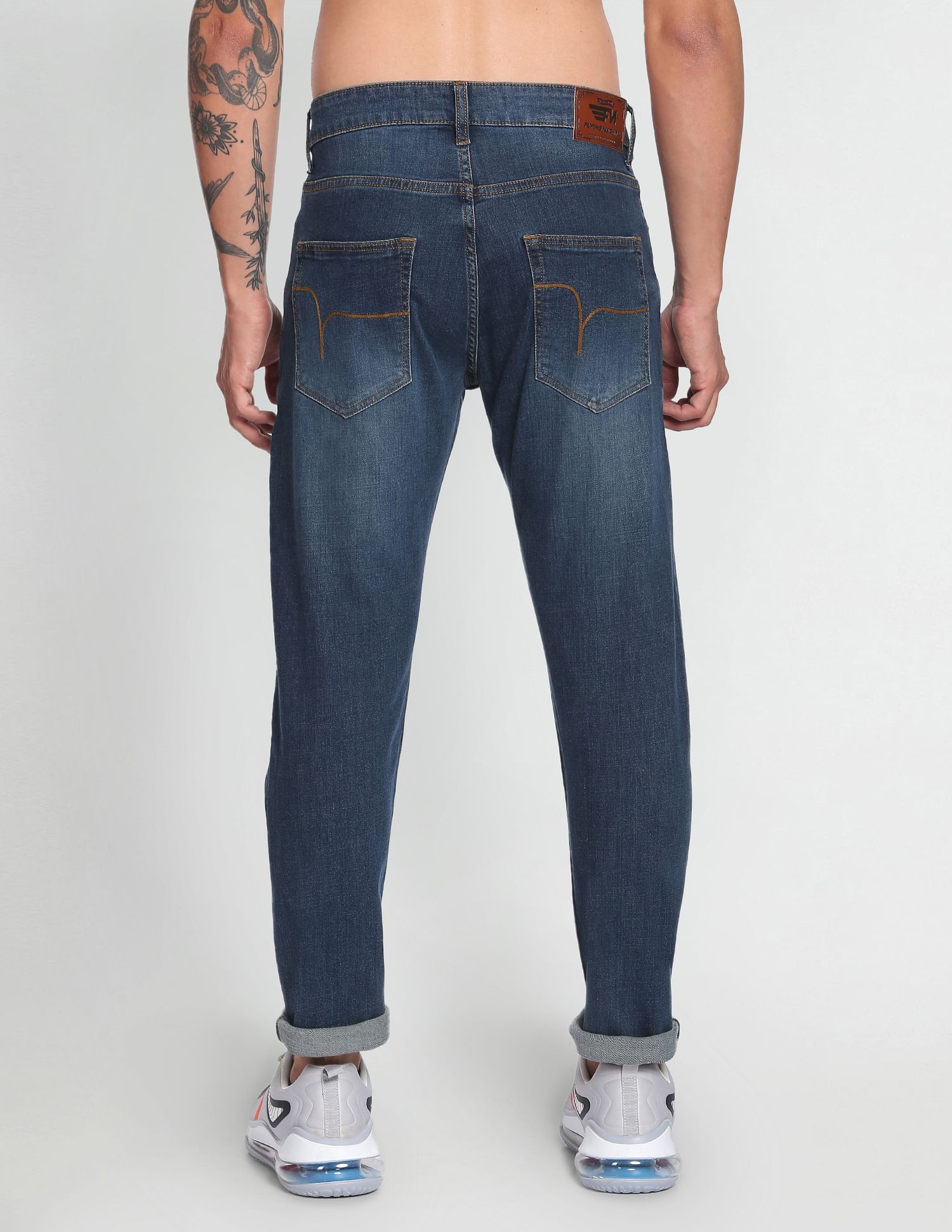 Flying Machine Mid Rise Slash Slim Tapered Jeans