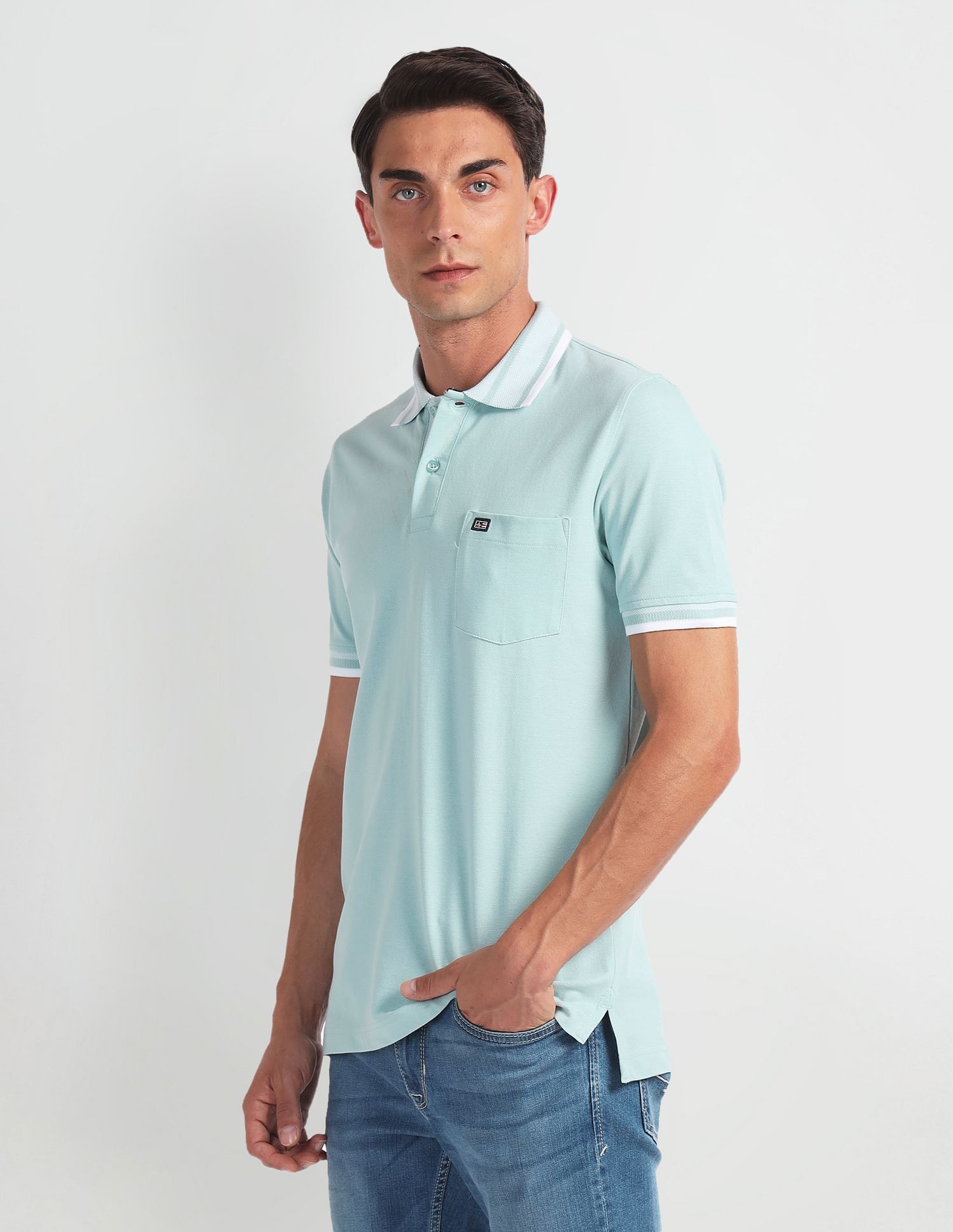 Arrow Sports Striped Collar Solid Polo Shirt