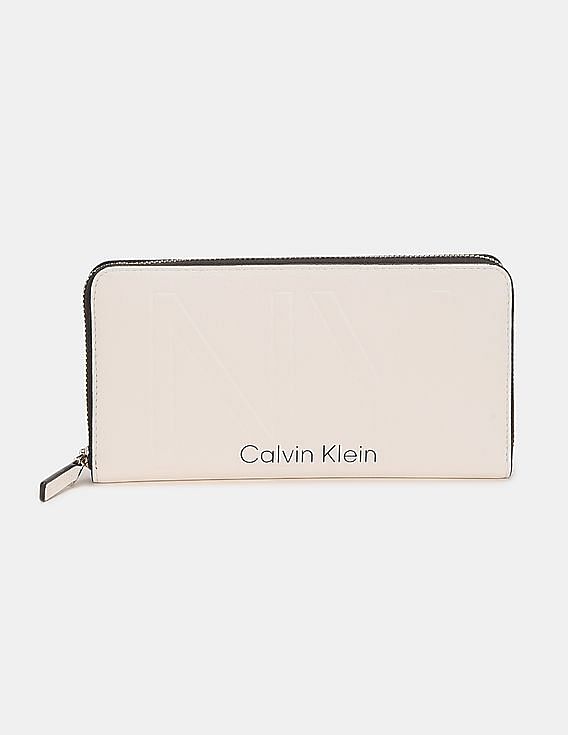 Buy Calvin Klein Women White Embossed Upper Ziparound Wallet 