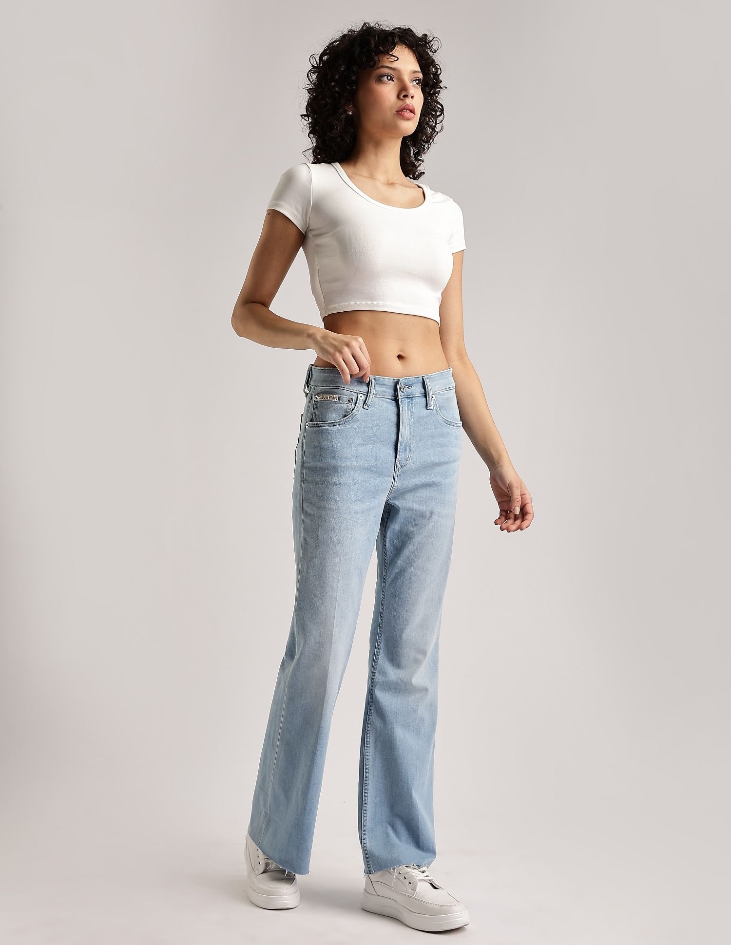 Calvin Klein Jeans Light-Wash Mid Rise Bootcut Jeans