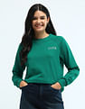 U.S. Polo Assn. Women Crew Neck Raglan Sleeve Solid Sweatshirt