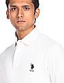U.S. Polo Assn. Men White Long Sleeves Solid Polo Shirt