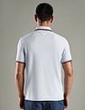 Tommy Hilfiger Solid Regular Fit Cotton Polo T-Shirt